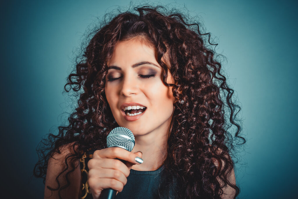 Woman With Microphone Singing