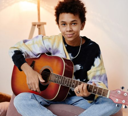 Teen Boy With Guitar